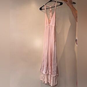 size M cocktail dress. Silky pink with white trim. Racerback with low cut.